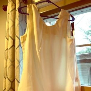 Off white sleeveless blouse